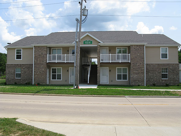 A large apartment complex from across the street